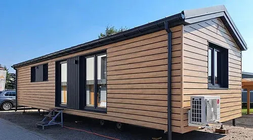 Casa Mobile 37-42 m² – 10,5 x 4 m – Bardage Legno Naturale e Tetto a Doppia Falda - immagine 1