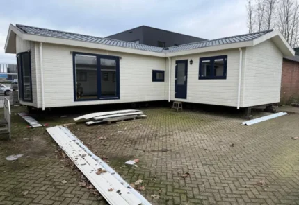 Casa mobile forma L 10,35 x 8,55 m con due camere - immagine 1