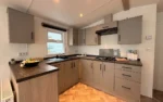 Casa mobile Oceania 10 x 4 m con cucina a U - immagine 5
