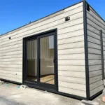 Casa modulare Aspe 8 x 3 m – 24 m² con parquet rovere, cucina e bagno con doccia - immagine 1