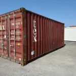 Container marittimo 20 piedi usato – ex TEX, rosso bordeaux, usura intensa, circa 33 m³ - immagine 1
