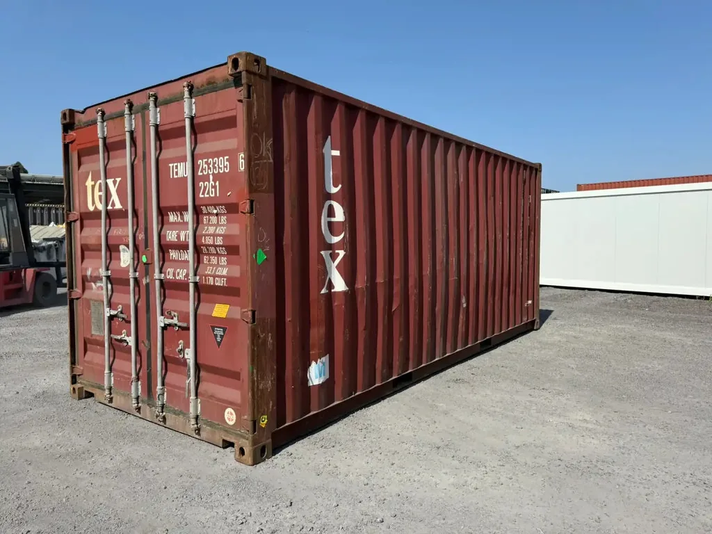 Container marittimo 20 piedi usato – ex TEX, rosso bordeaux, usura intensa, circa 33 m³ - immagine 1