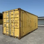 Container marittimo 20 piedi usato – giallo ocra, usura pronunciata, 33,2 m³ - immagine 1
