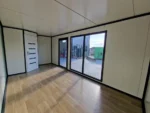 Container Ufficio 6 x 3 m Antracite con Lame in Legno e Vetrate Scorrevoli - immagine 3