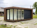 Container Ufficio 7 x 3 m — Pannelli Noce Scuro e Grigio con Vetrate a Tutta Altezza - immagine 2
