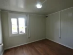Container Ufficio Modello Residenziale — Pannelli Grigio Chiaro con Profili Antracite e Finestre PVC Bianche - immagine 6