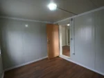 Container Ufficio Modello Residenziale — Pannelli Grigio Chiaro con Profili Antracite e Finestre PVC Bianche - immagine 8