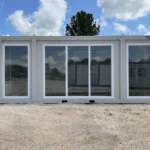 Container Ufficio Wolf Tiny Modello Casa de Cristal 3 x 7 m — Facciata Interamente Vetrata Bianca - immagine 1