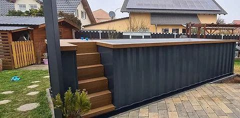 Piscina container Premium 6,11 m grigio antracite con scala WPC e pompa di calore - immagine 1