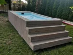 Piscina monoblocco in fibra di vetro rivestita in legno di pino 5 m × 2,20 m - immagine 3